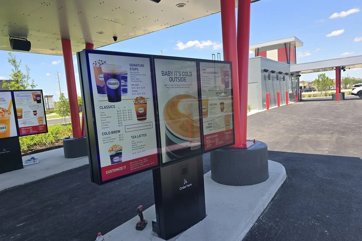 Drive-thru coffee shop with professional digital menu boards installation