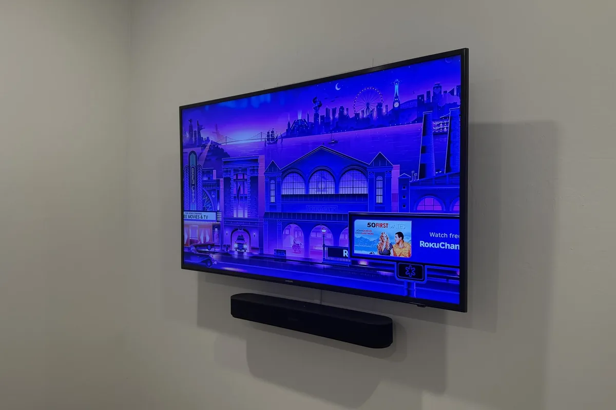 Wireless TV mounting with LG TV and SONOS Beam Soundbar with flush mount in Naples